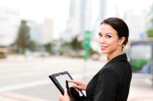 Young Businesswoman on Downtown Sidewalk